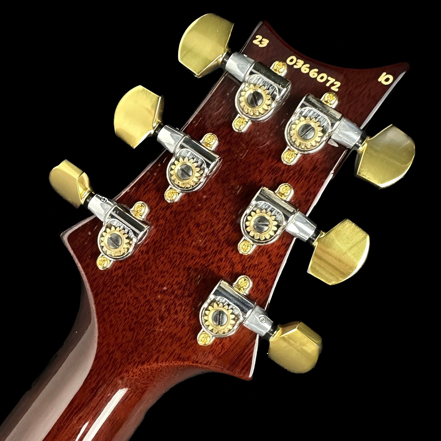 Back of headstock of PRS Special Semi-hollow Orange Tiger.