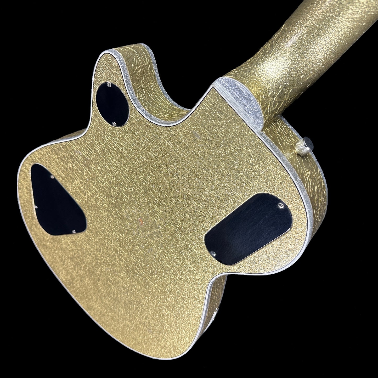 Back angle of Gretsch Custom Shop G6134CS-59 Penguin Gold Sparkle.