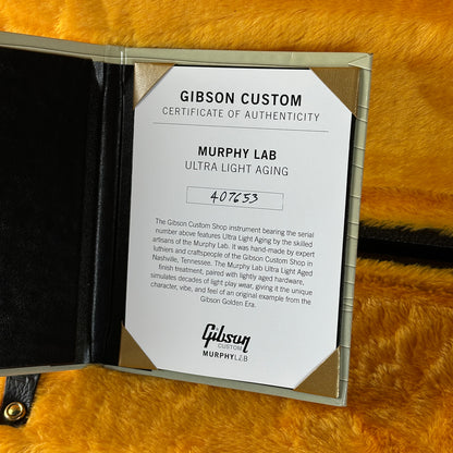 Gibson Custom Certificate of Authenticity for Murphy Lab Ultra Light Aging on a textured surface