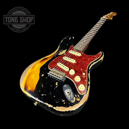 Front angle of Fender Custom Shop Limited Edition Roasted '60 Strat Super Heavy Relic Aged Black Over 3 Color Sunburst.