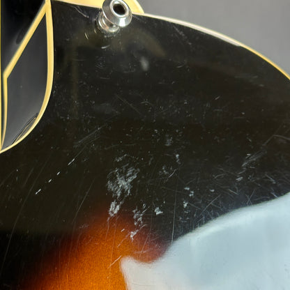 Scratches on back of Used Epiphone ES-175 Reissue Burst.
