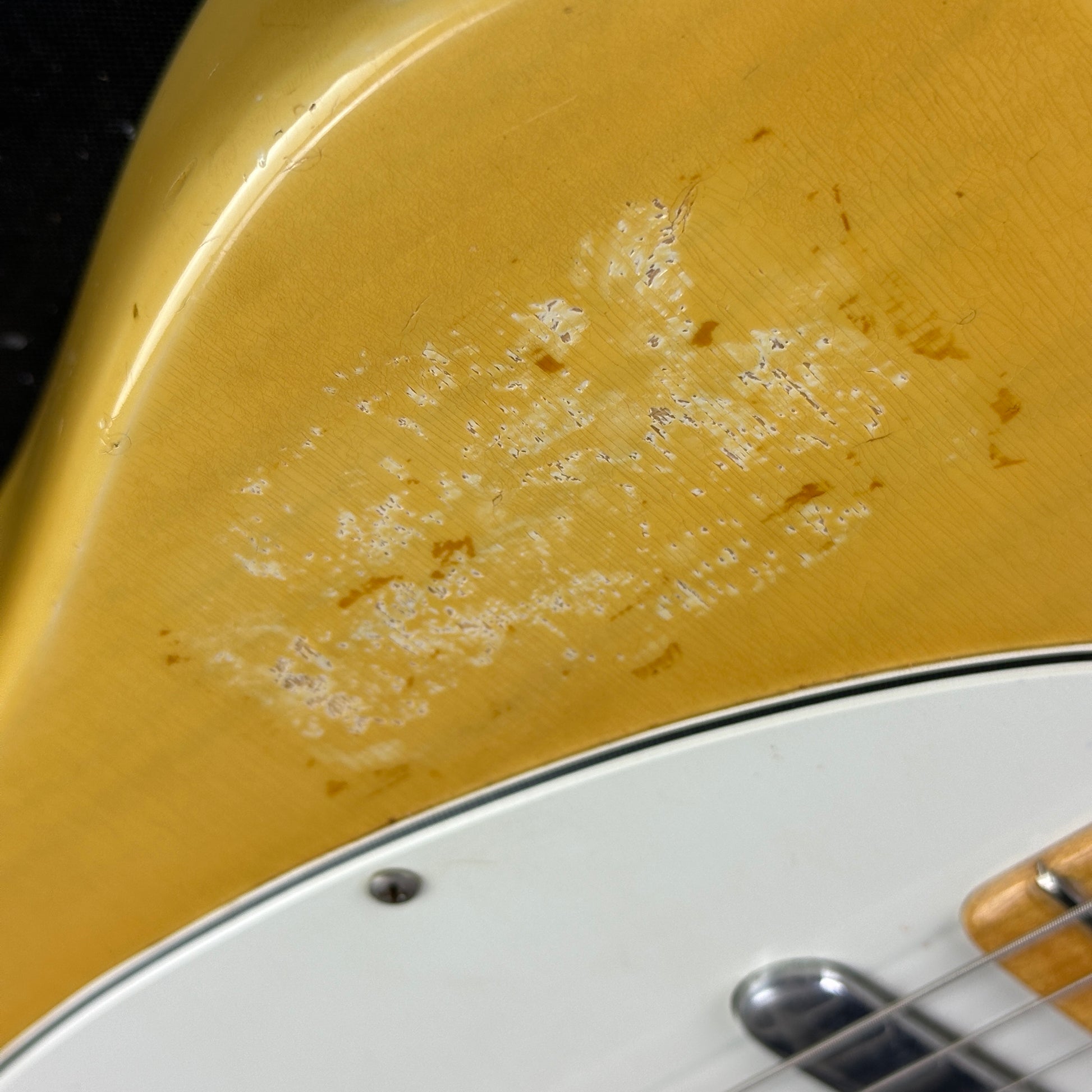 Damage near pickguard of Vintage 1974 Fender Telecaster.