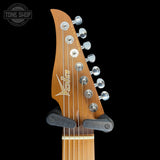 Headstock of Used Vola Guitars Vasti 7PDMJ1 OGD Matte.