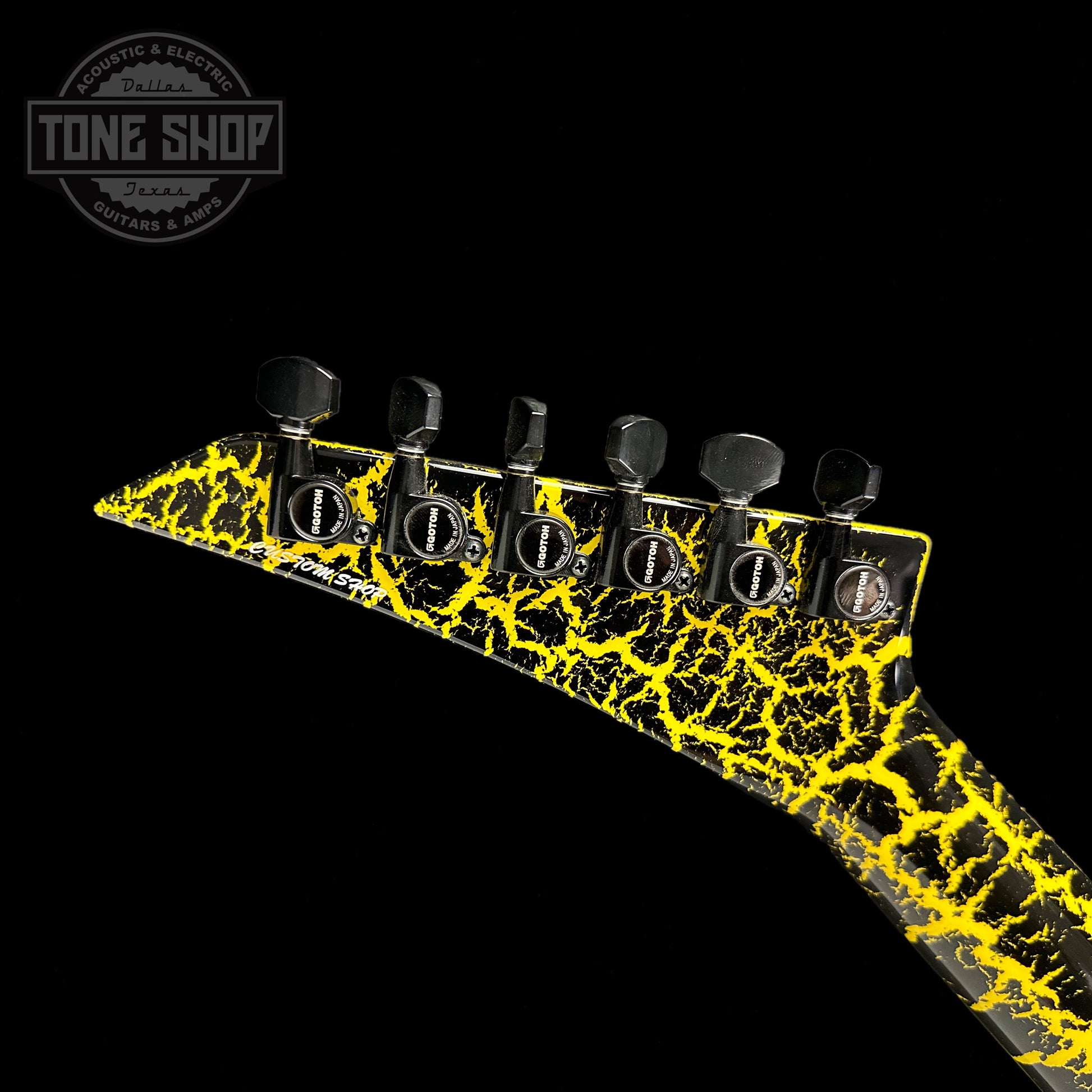 Back of headstock of Jackson Custom Shop Limited Edition Randy Rhoads Nos Black With Yellow Crackle.