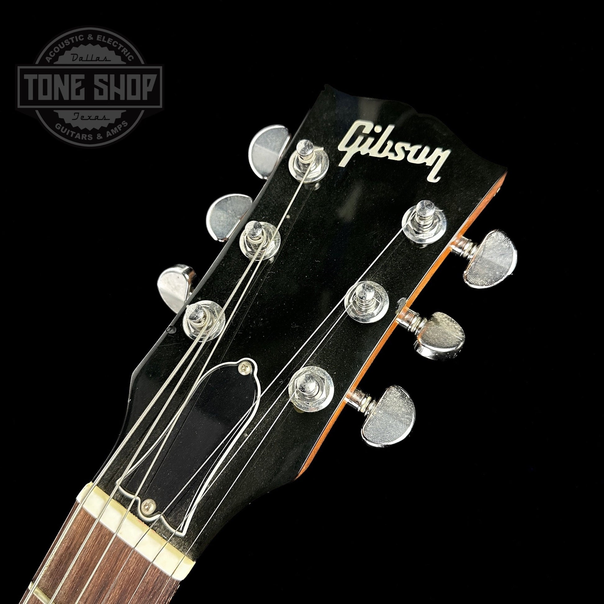 Front of headstock of Used 2010 Gibson RD Natural.