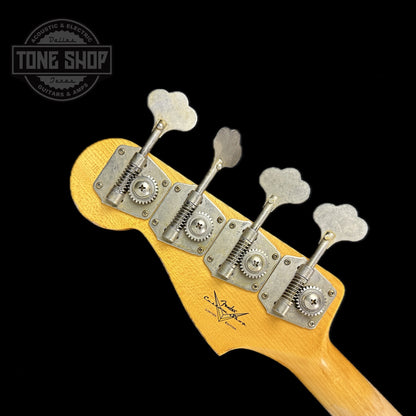 Back of headstock of Used Fender Custom Shop LTD '60s Jazz Bass Olympic White Relic Aged.