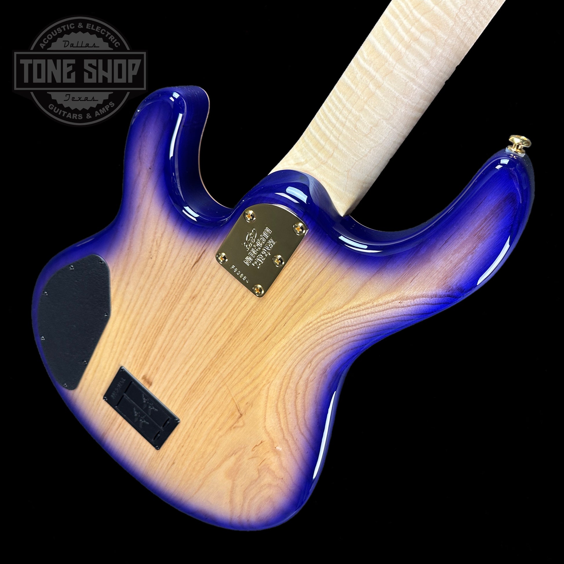 Back angle of Ernie Ball Music Man BFR "Moonbeam" StingRay Special 5 HH 5-String Bass Figured White Maple Fretboard Trans Purple Burst.