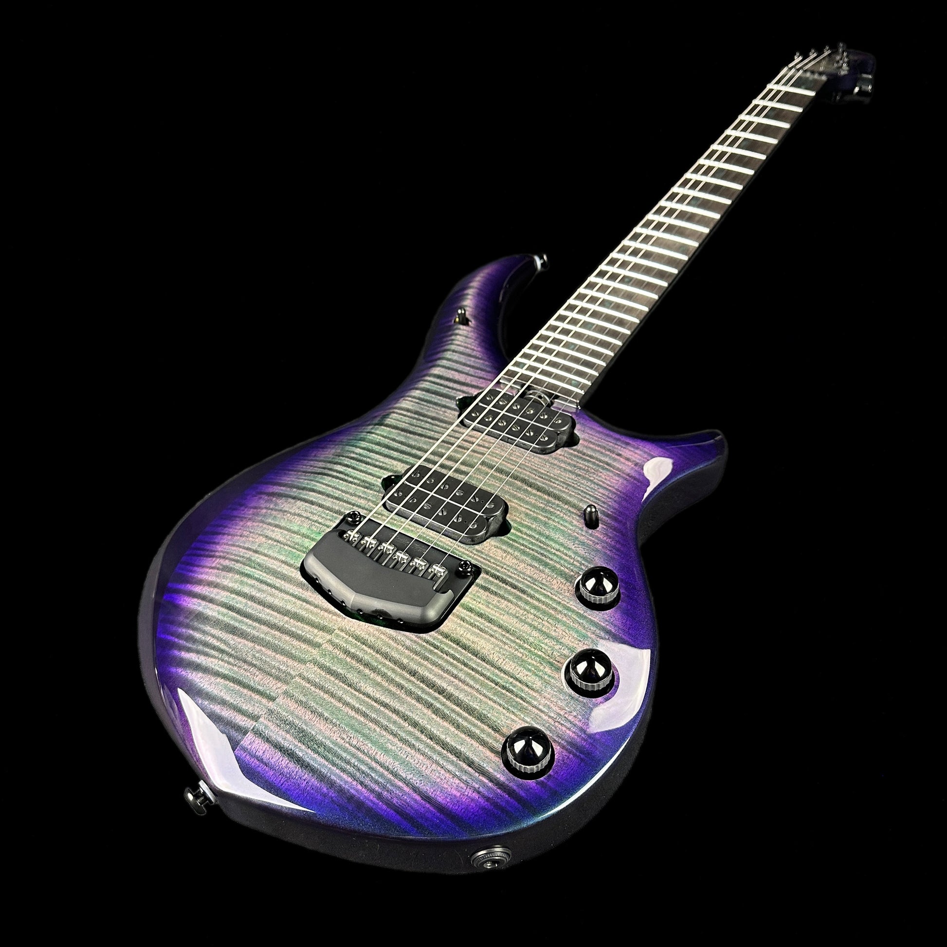 Front angle of Ernie Ball MusicMan Majesty 6 Limited Crystal Amethyst.