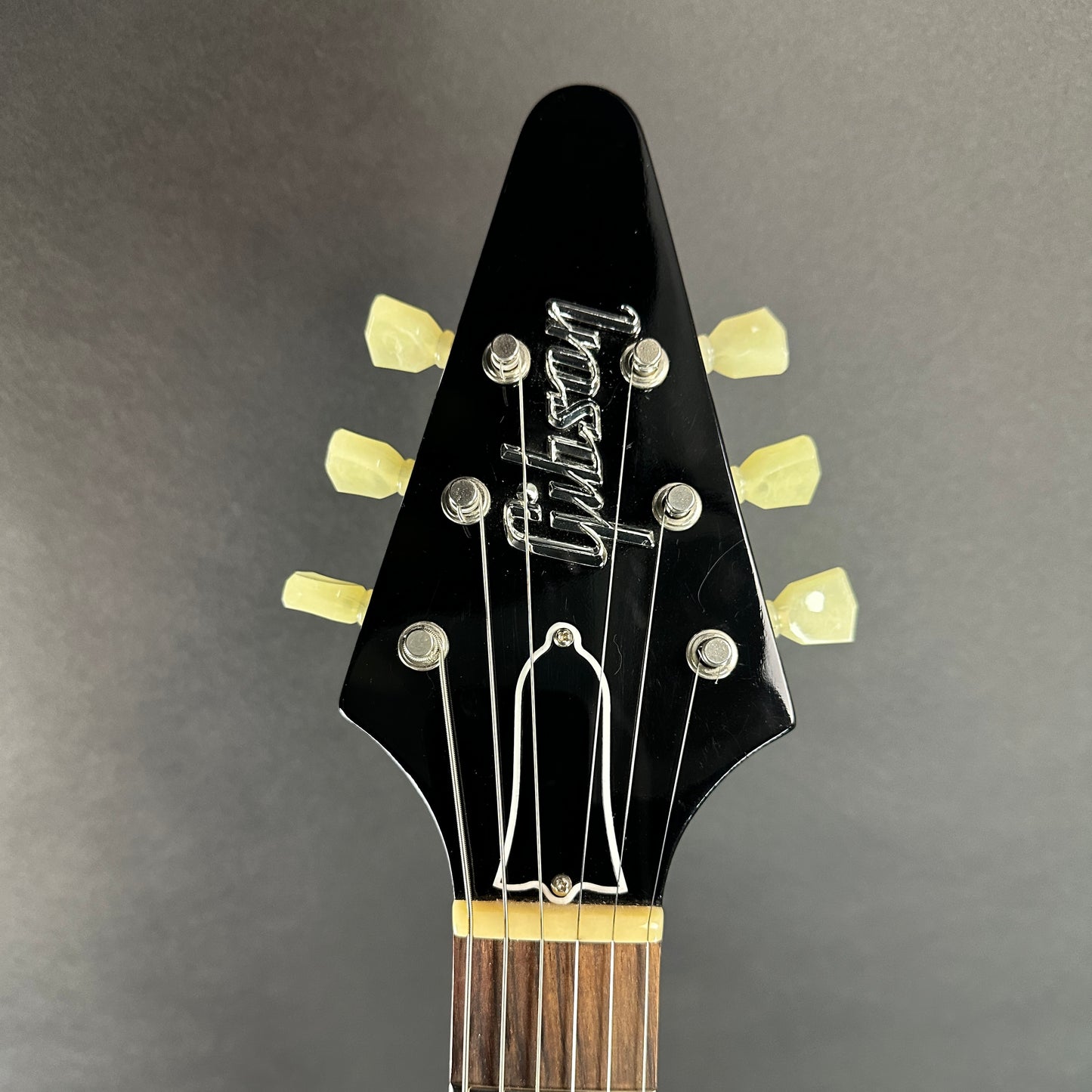 Front of headstock of Used 2017 Gibson Custom Flying V Black Doghair.