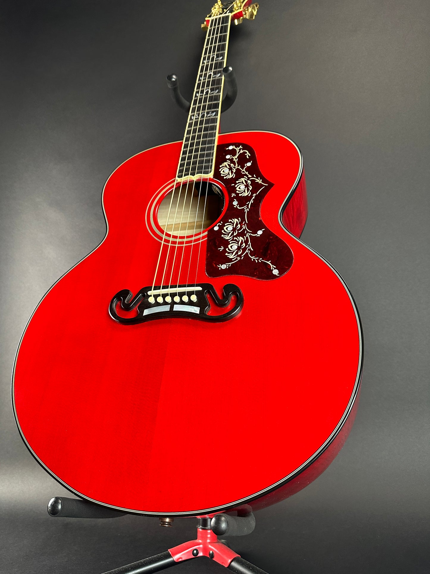 Front angle of Used 2021 Gibson Orianthi SJ-200 Trans Red.