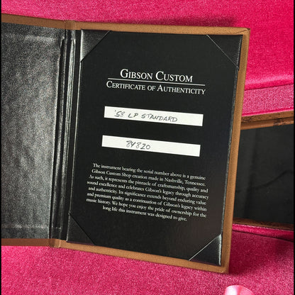 Gibson Custom Certificate of Authenticity on a pink background