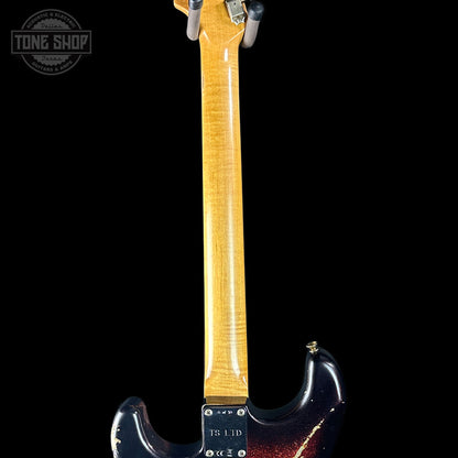 Guitar neck with a 'Tone Shop' logo in the corner