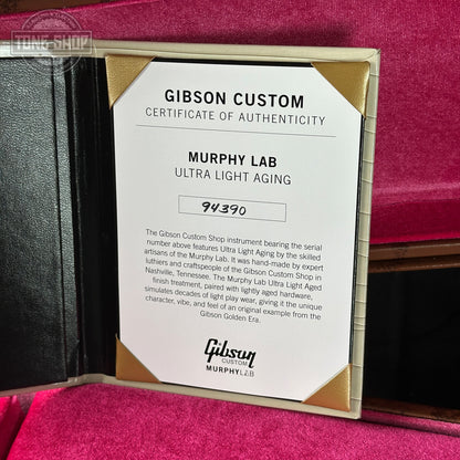 Gibson Custom Certificate of Authenticity for Murphy Lab Ultra Light Aging on a red background