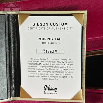 Gibson Custom Certificate of Authenticity for Murphy Lab Light Aging on a red background
