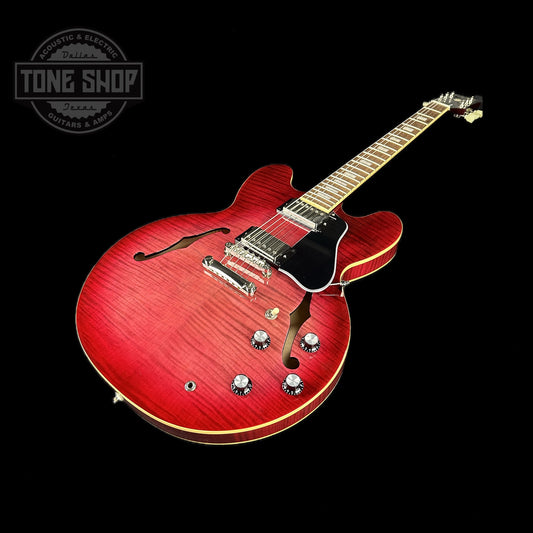 Front angle of Used Epiphone ES-335 Figured Limited Raspberry Burst.