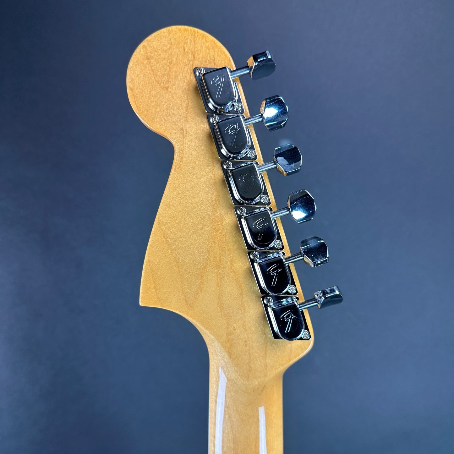 Back of headstock of Used Fender 60th Anniversary Jaguar Mystic Lake Placid Blue.