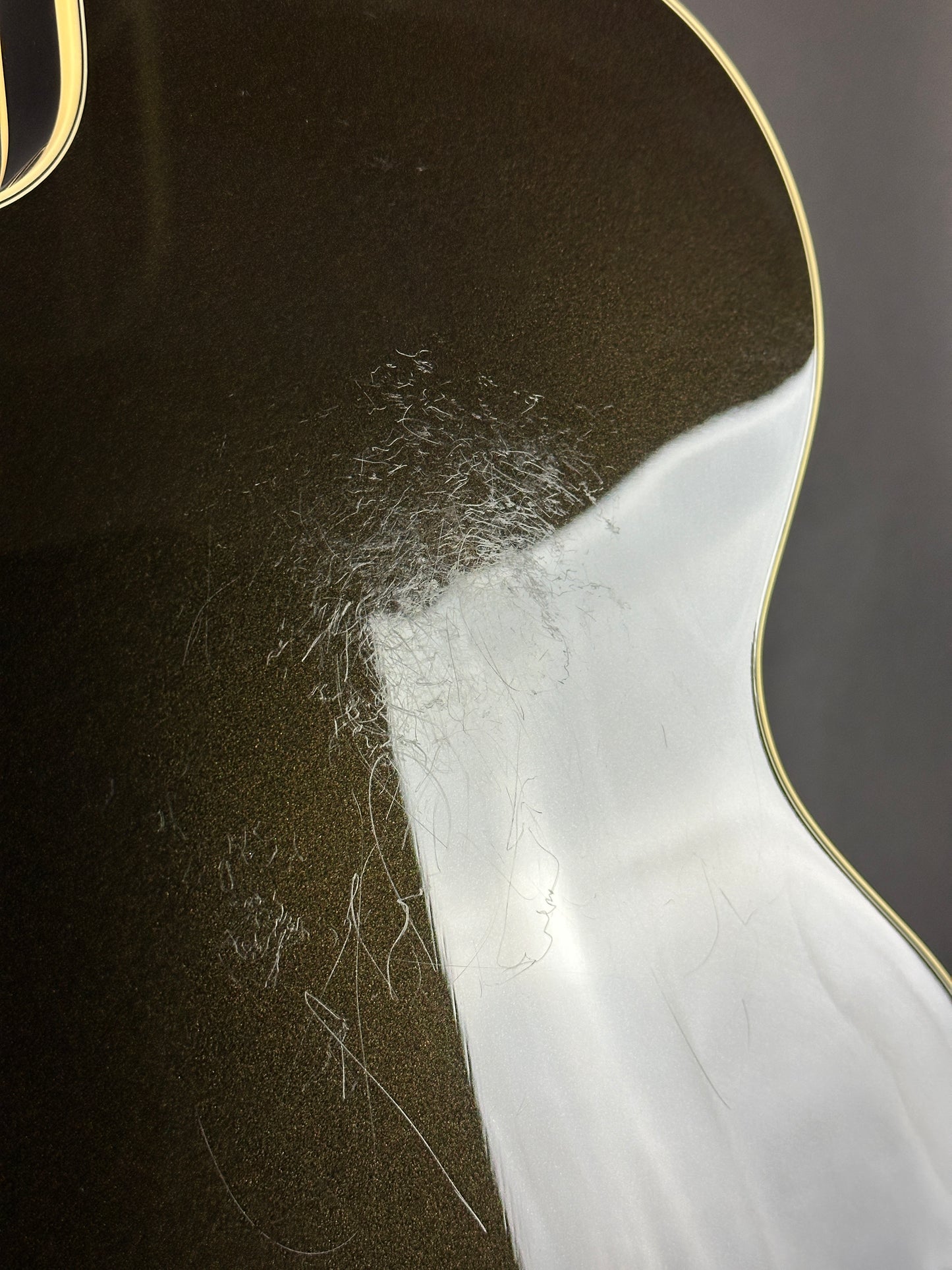 Scratches on back of Used Gretsch G5655TG-CB-JR.