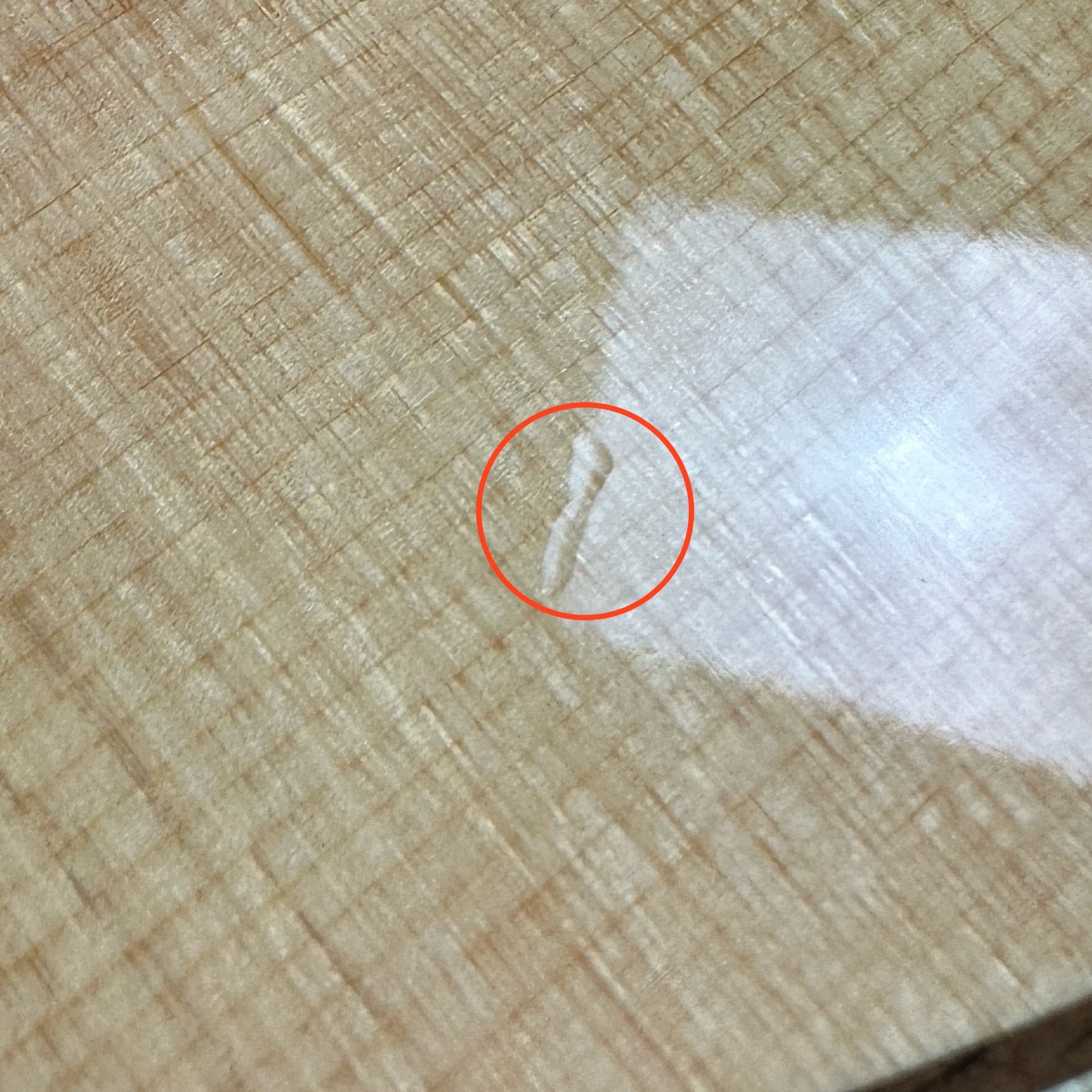 Dent on front of body of Used 2019 Taylor 814ce Natural.