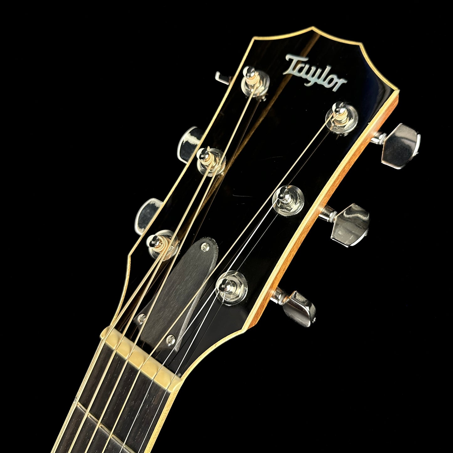 Front of headstock of Used Taylor 818e.