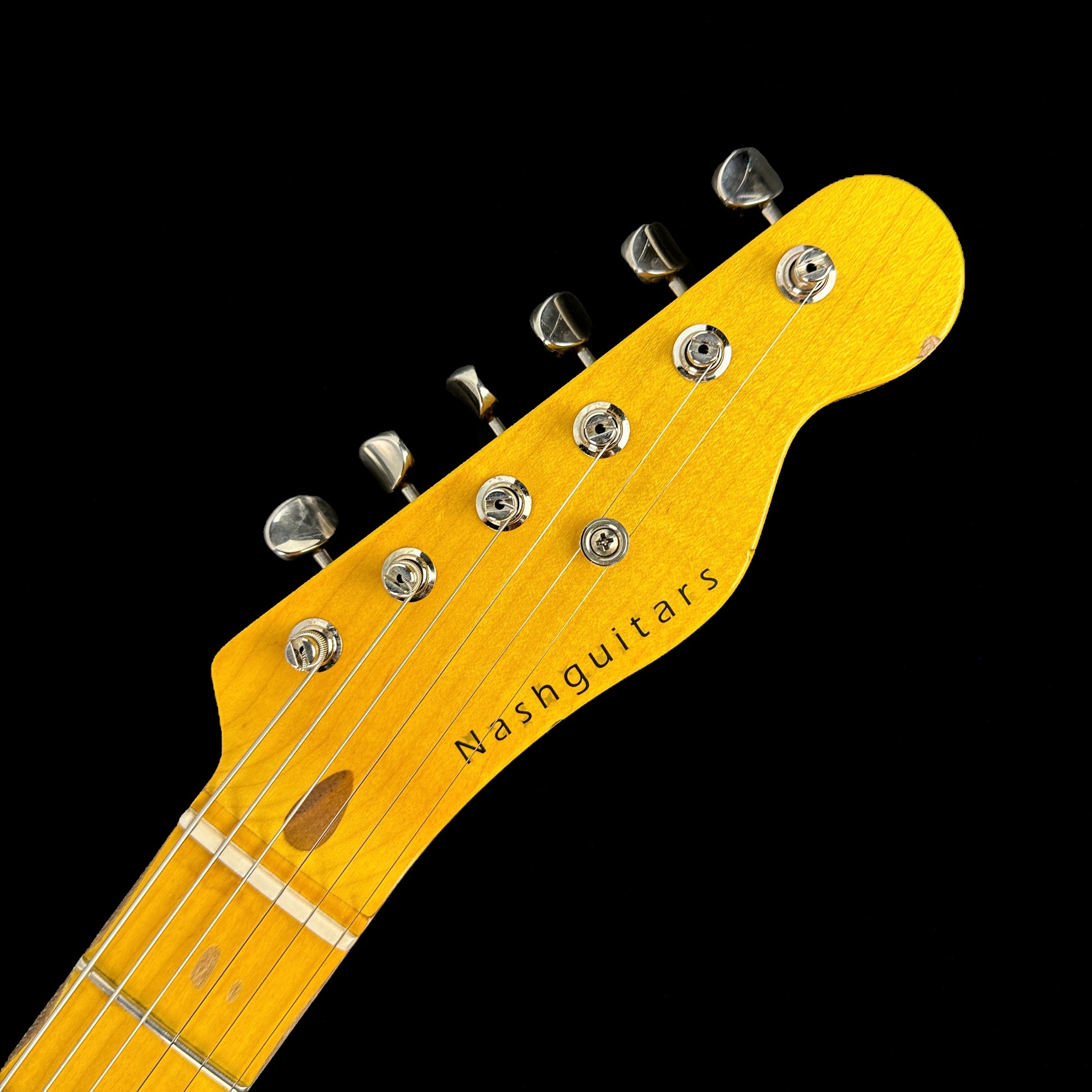 Front of headstock of Nash T-52 Butterscotch Blonde Ash/MP Light Aging.