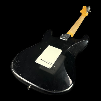 Back angle of Fender Custom Shop Postmodern Strat RW Journeyman Relic w/Closet Classic Hardware Aged Black.
