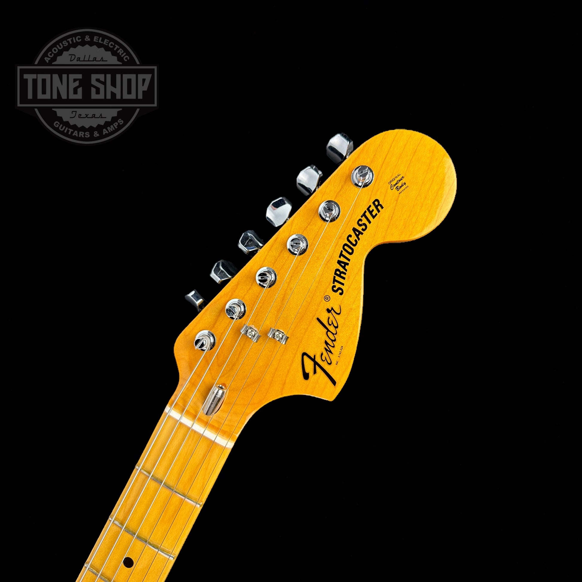 Front of headstock of Used Fender American Vintage II 70's Stratocaster Lake Placid Blue.