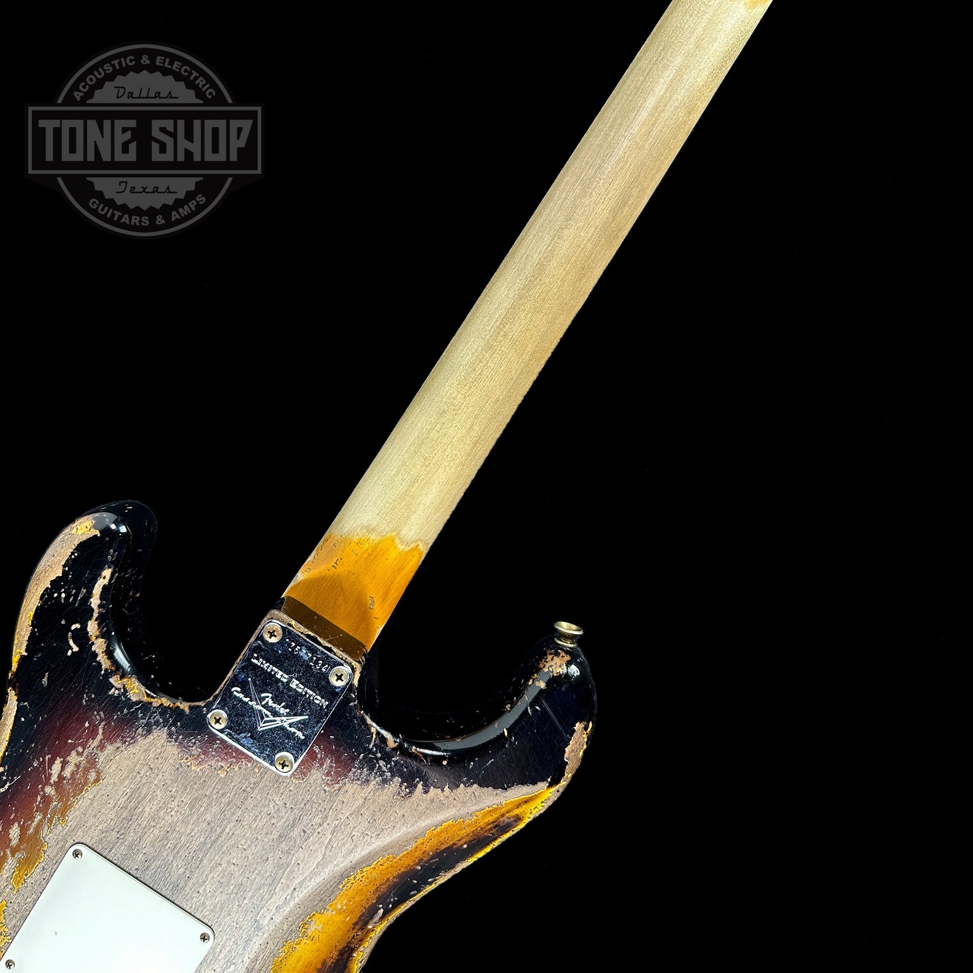 Back of neck of Fender Custom Shop Limited Edition 61 Bone Tone Strat Super Heavy Relic Super Faded Aged 3 Color Sunburst.