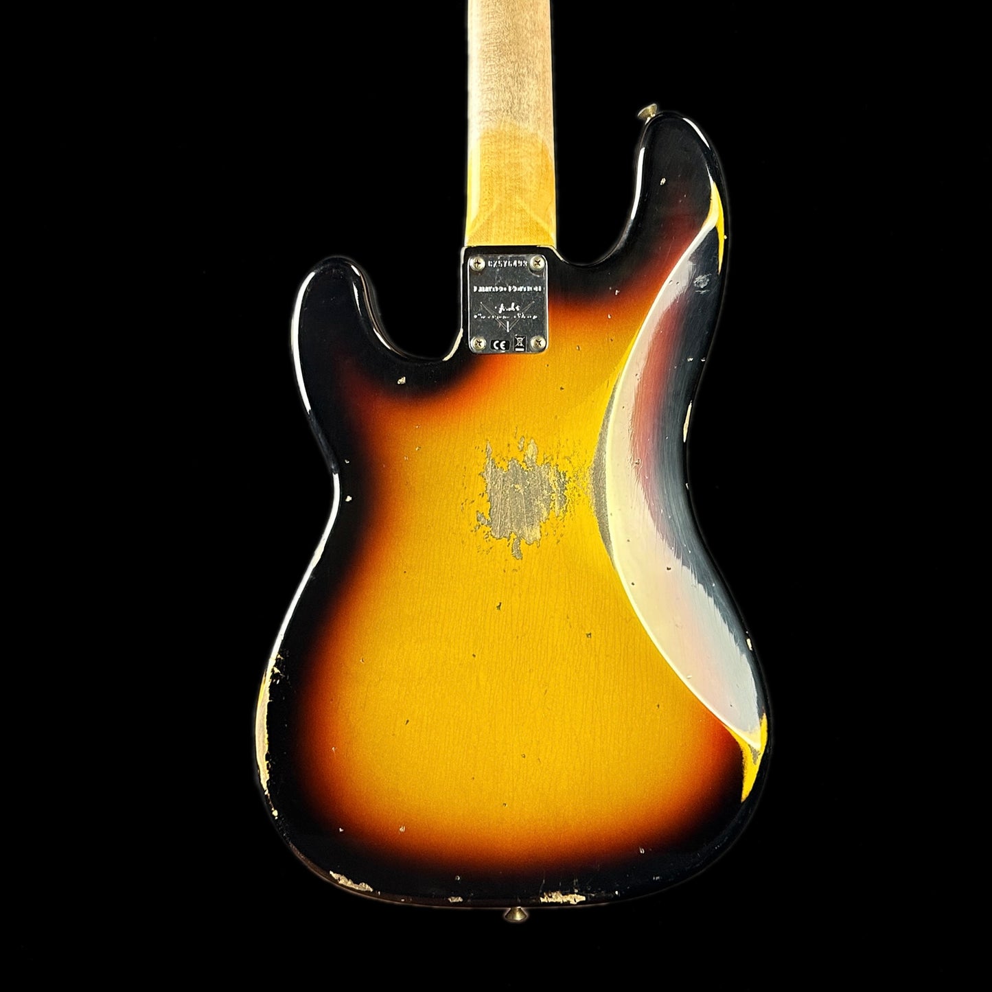 Back of body of Fender Custom Shop Limited Edition '63 Precision Bass Heavy Relic Faded Aged 3 Color Sunburst.