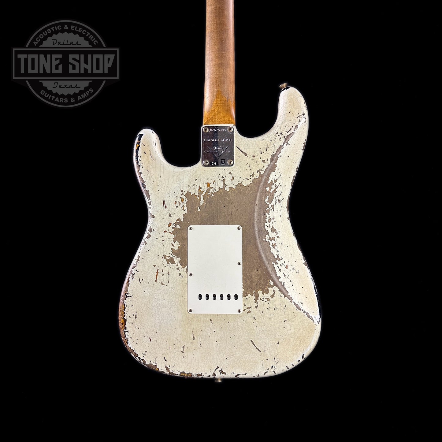 Back o fbody of Fender Custom Shop Limited Edition Roasted '60 Strat Super Heavy Relic Aged Olympic White Over 3 Color Sunburst.