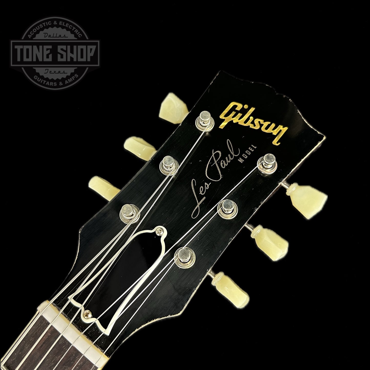 Front of headstock of Gibson Custom Shop M2M 1956 Les Paul Standard Chambered Goldtop Murphy Lab Light Aged.