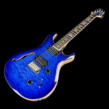 Front angle of Used PRS SE Custom 22 Semi-Hollow Blue.