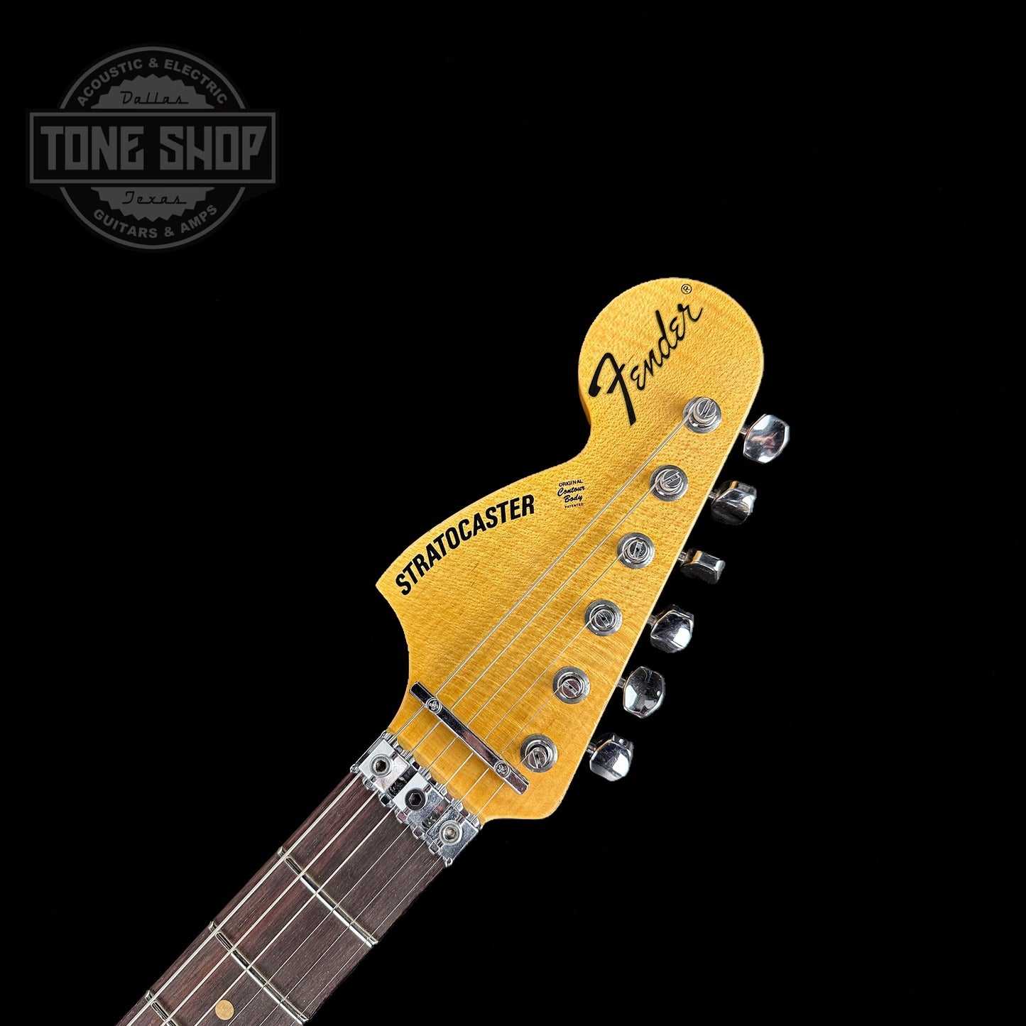 Front of headstock of Fender Custom Shop 69 Stratocaster Relic HSS Oly White Reverse Headstock.
