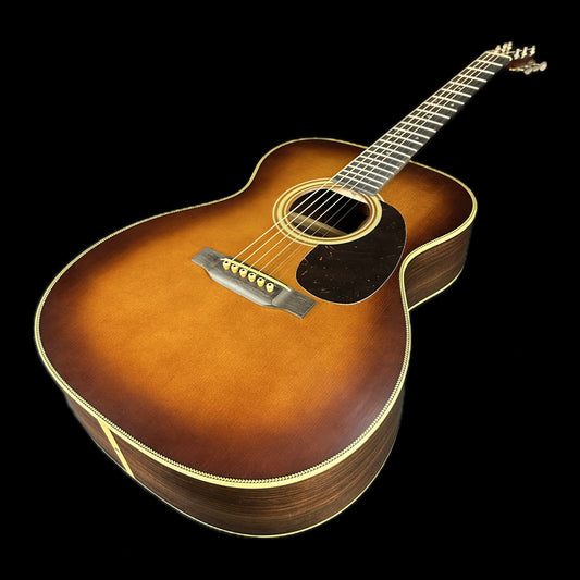 Front angle of Used Martin Custom Shop 000-28 Authentic 1937 Stage 1 Aging Ambertone Burst.