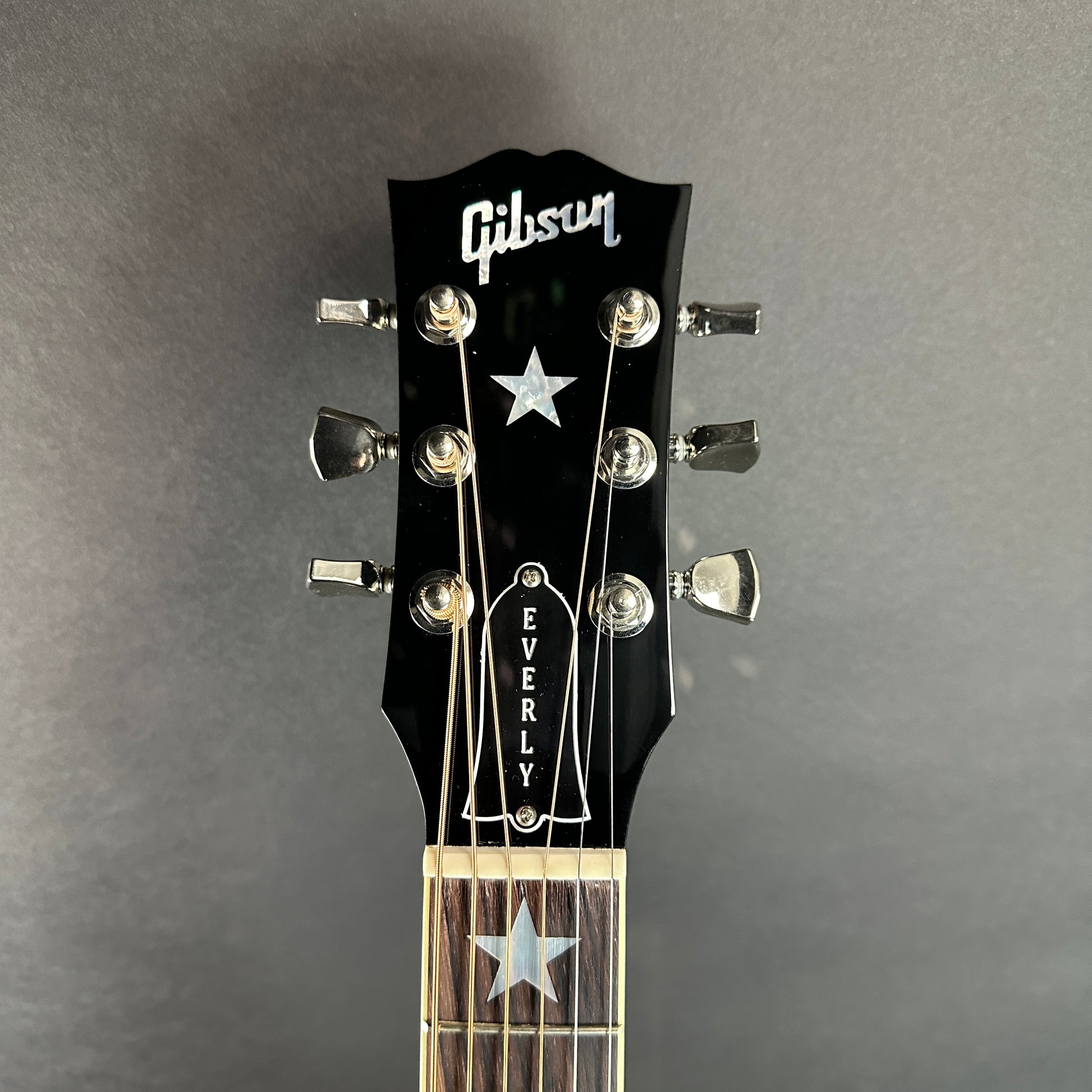 Front of headstock of Used 2024 Gibson Everly Brothers J-180 Ebony.