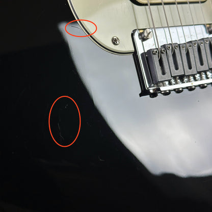 Scratches near bridge of Used Fender Special Edition Player Strat Black.