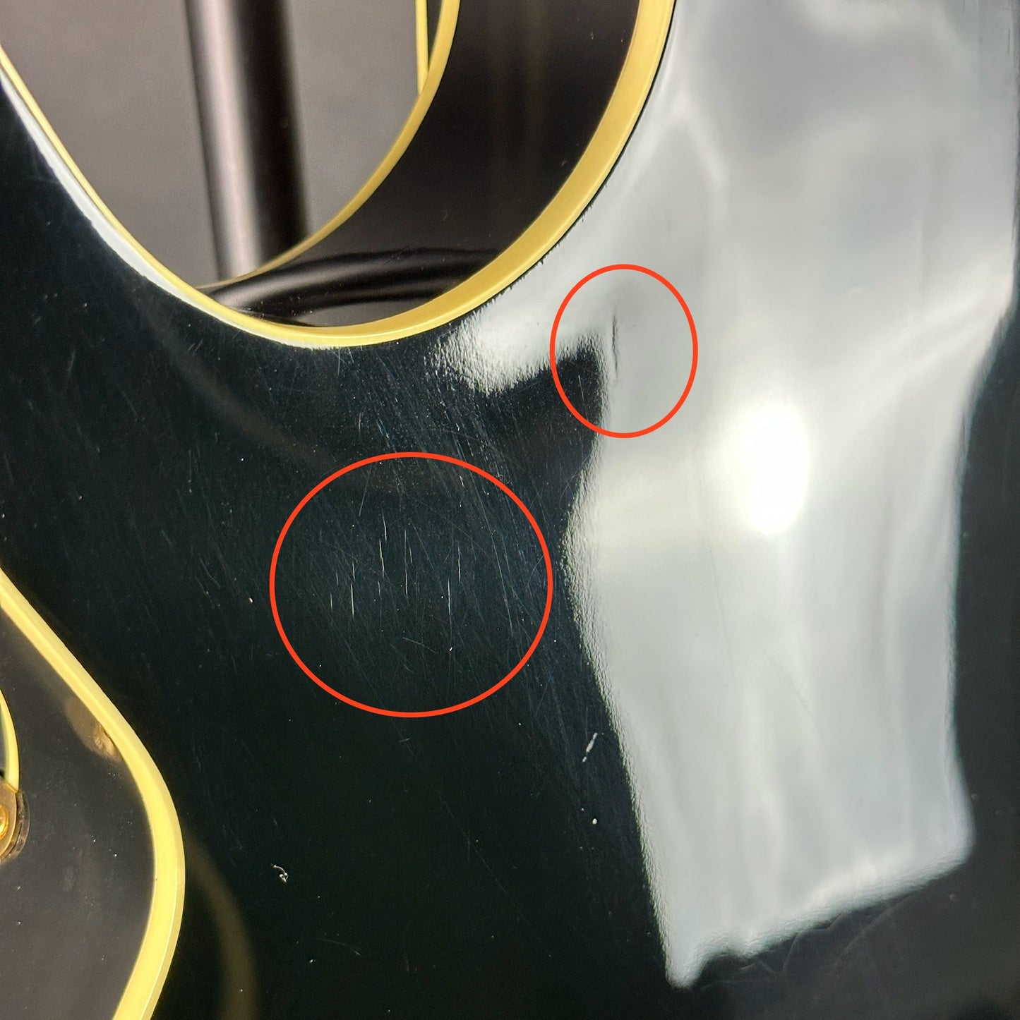 Scratches on back of Used 1995 Gibson Howard Roberts Fusion Ebony.