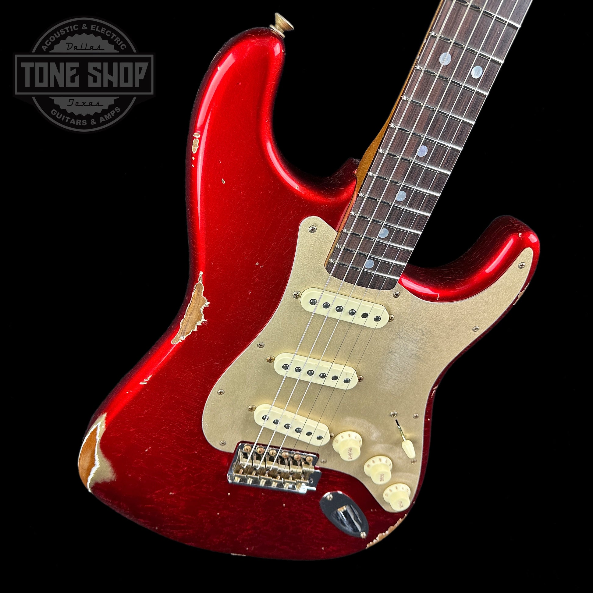 Front angle of Fender Custom Shop 2023 Collection Ltd Roasted Big Head Strat Relic Aged Candy Apple Red.