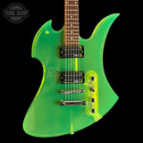 Used BC Rich Mockingbird Trans Green Acrylicelectric guitar with a clear body on a black background, featuring the Tone Shop logo.