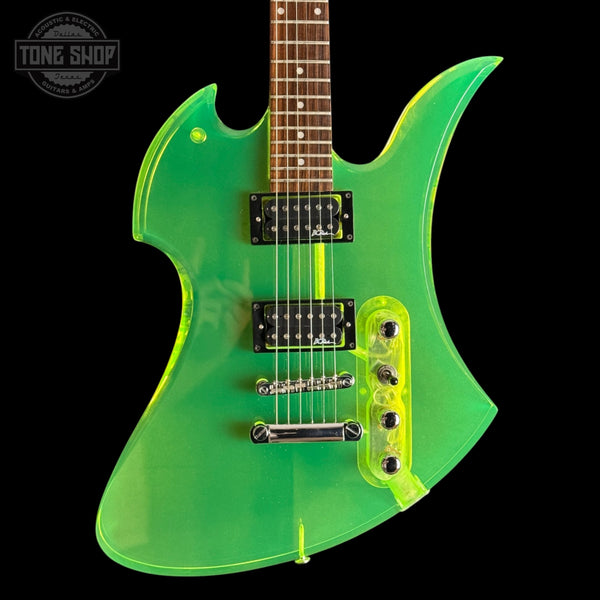 Used BC Rich Mockingbird Trans Green Acrylicelectric guitar with a clear body on a black background, featuring the Tone Shop logo.
