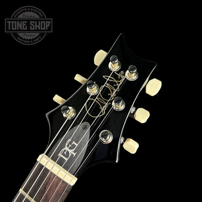 Front of headstock of PRS DGT David Grissom Trem 10 Top Purple Mist Birds.