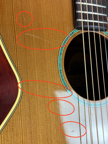 Scratches near soundhole of Used Takamine Santa Fe ESF40C.