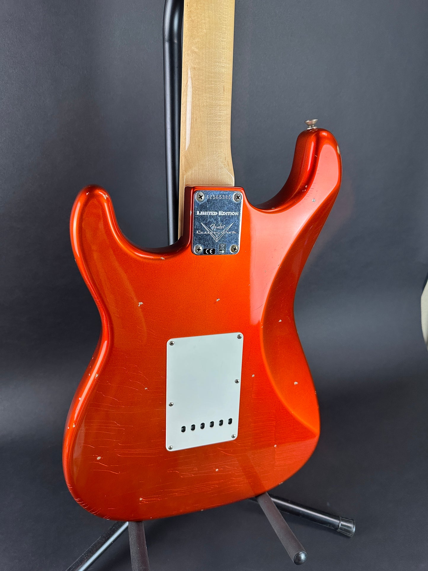 Back angle of Used Fender Custom Shop Ltd Ed 69 Strat Journeyman Relic Aged Candy Tangerine.