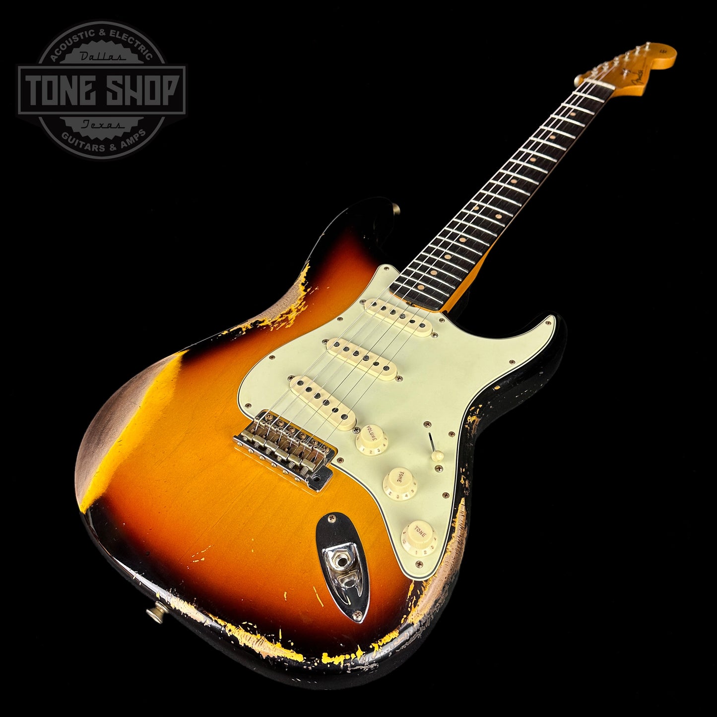 Front angle of Fender Custom Shop 2023 Collection 60 Strat Heavy Relic Faded Aged 3 Color Sunburst.