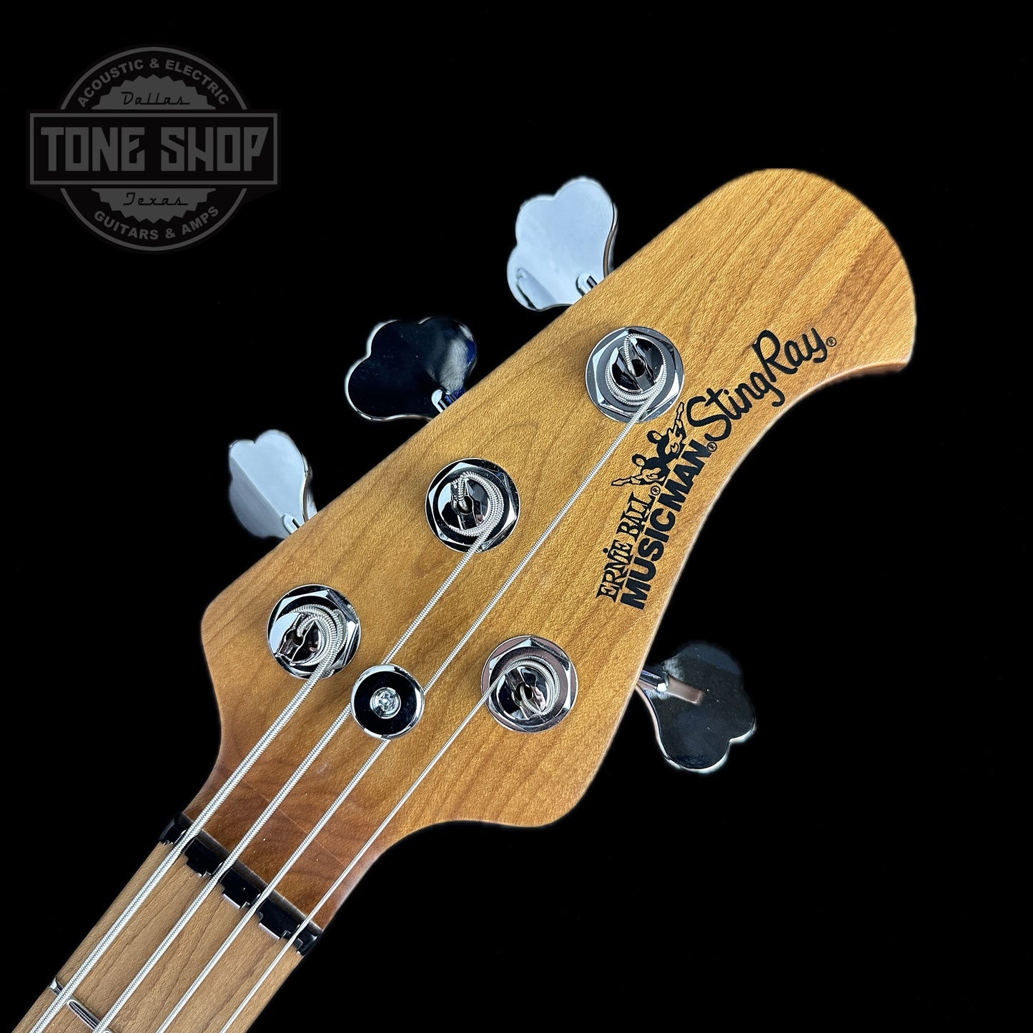 Front of headstock of Ernie Ball Music Man StingRay Special H Bass MP Hot Honey.