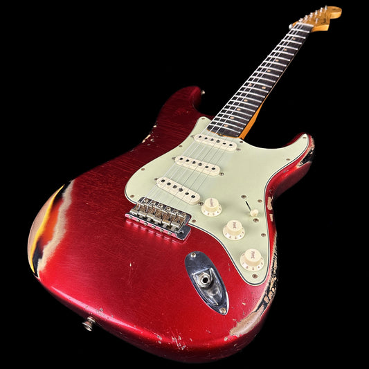 Front angle of Fender Custom Shop Limited Edition '62 Strat Heavy Relic Aged Candy Apple Red Over 3 Color Sunburst.