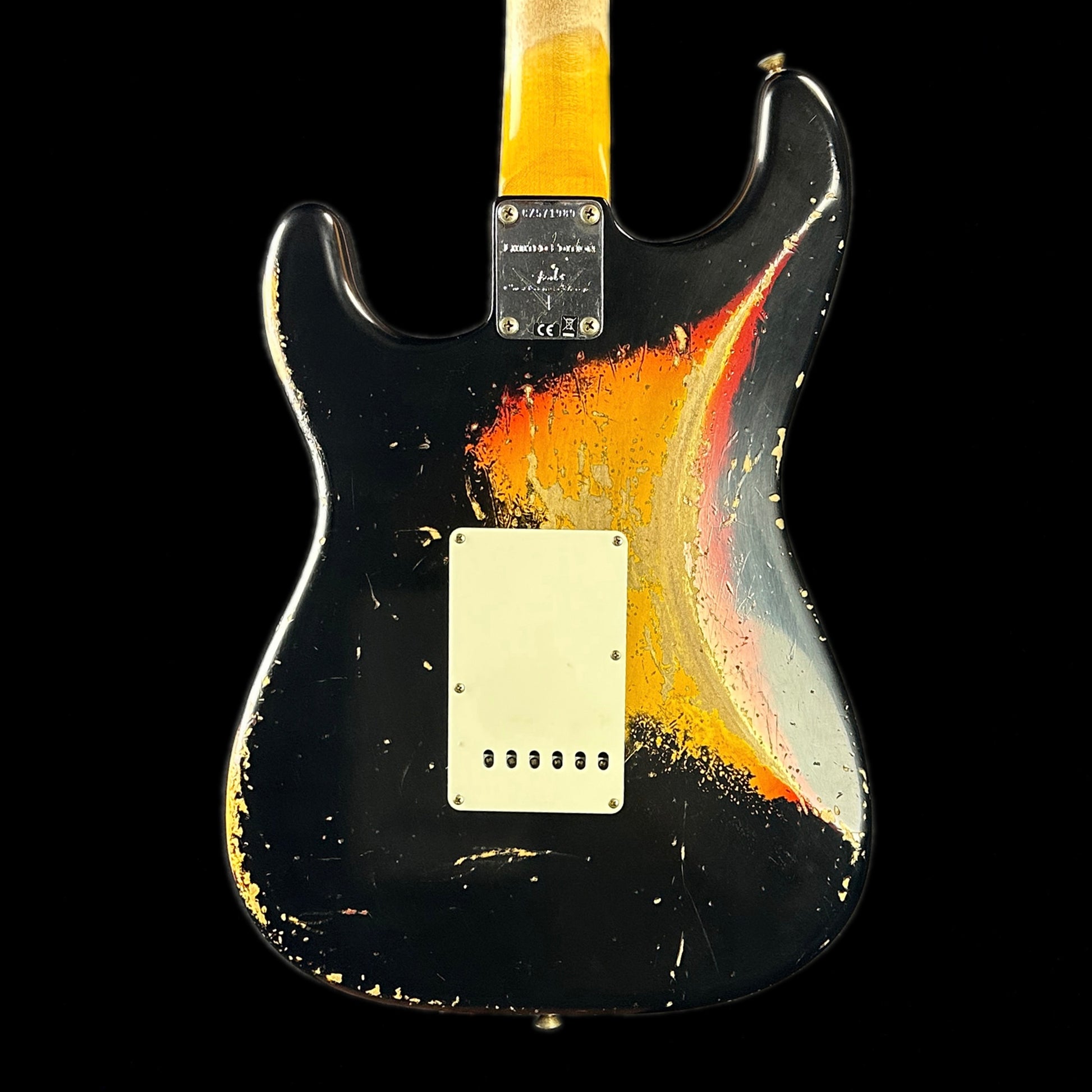 Back of body of Fender Custom Shop Limited Edition '62 Strat Heavy Relic Aged Black Over 3 Color Sunburst.