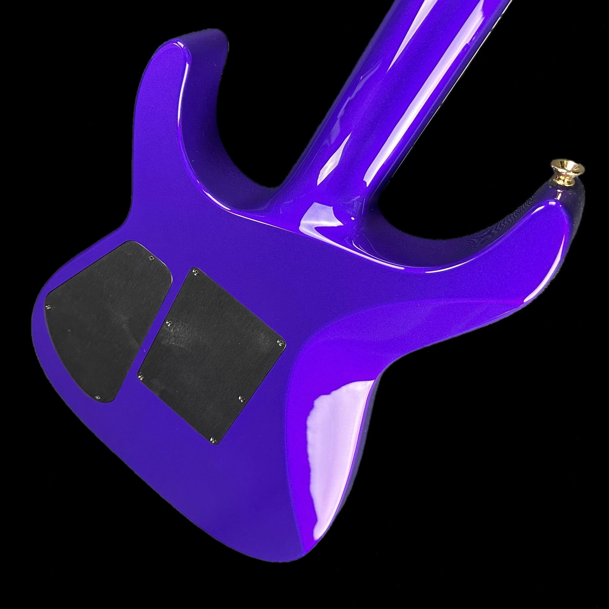 Back angle of Jackson Custom Shop SL 2H Floyd Rose Purple Metallic.