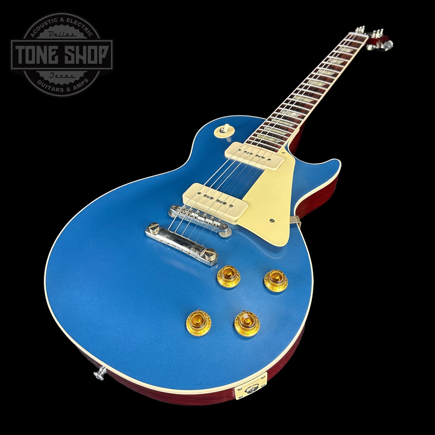 Front angle of Gibson Custom Shop M2M 1956 Les Paul Standard Chambered Pelham Blue Top VOS.
