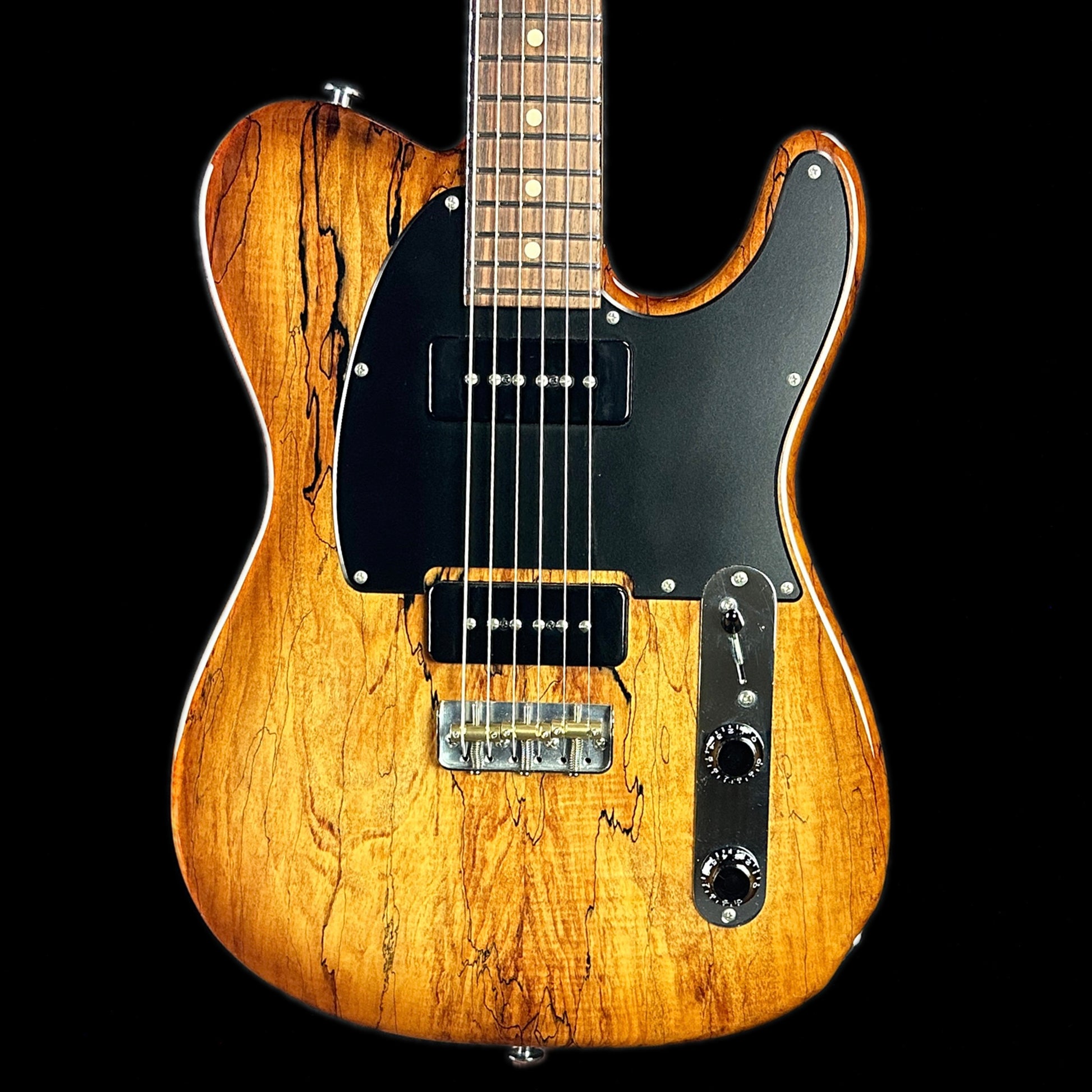 Front of body of Used Suhr Classic T Custom P90 Korina w/Spalted Maple Top.