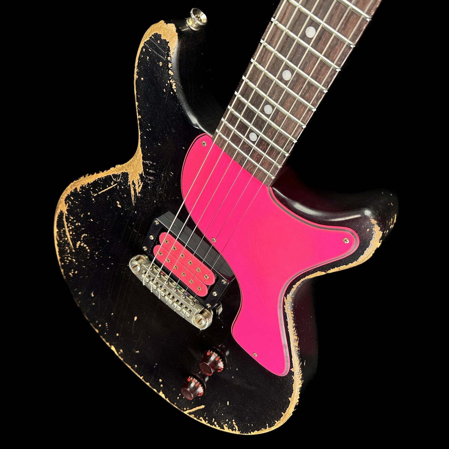 Front angle of Rock N Roll Relics Thunders DC Black w/Pink.